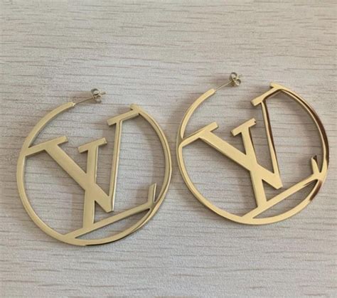 fake lv hoops|Louis Vuitton hoop earrings real vs fake. How to spot fake Louis .